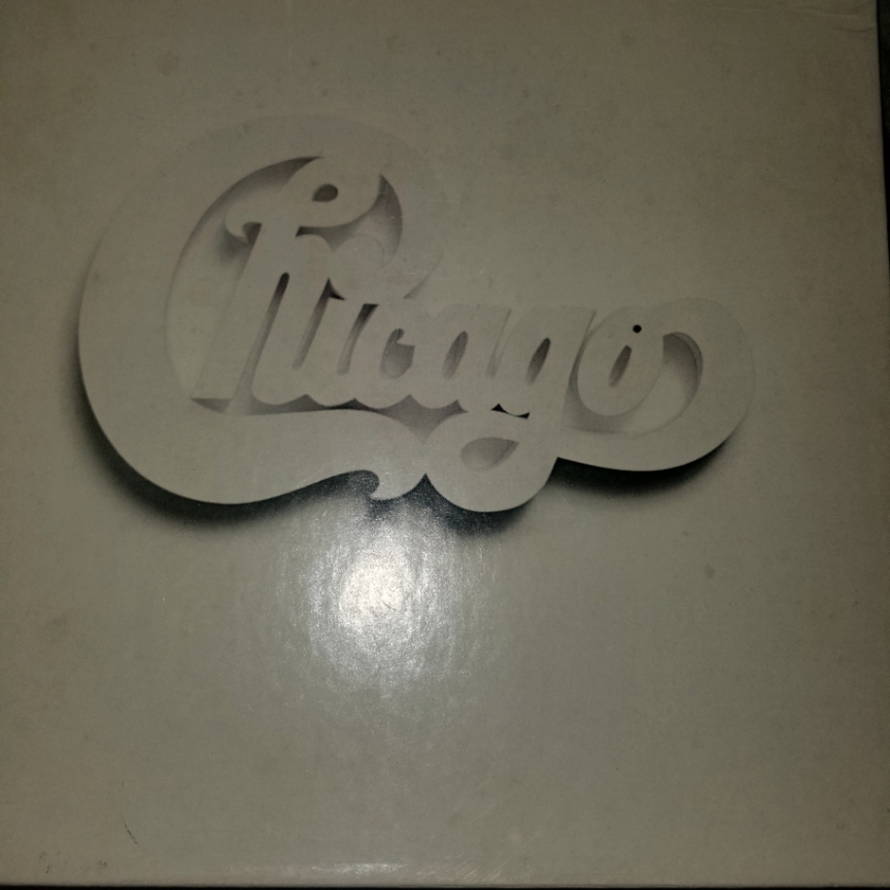 Chicago 4 album set . With 2 posters and band book .